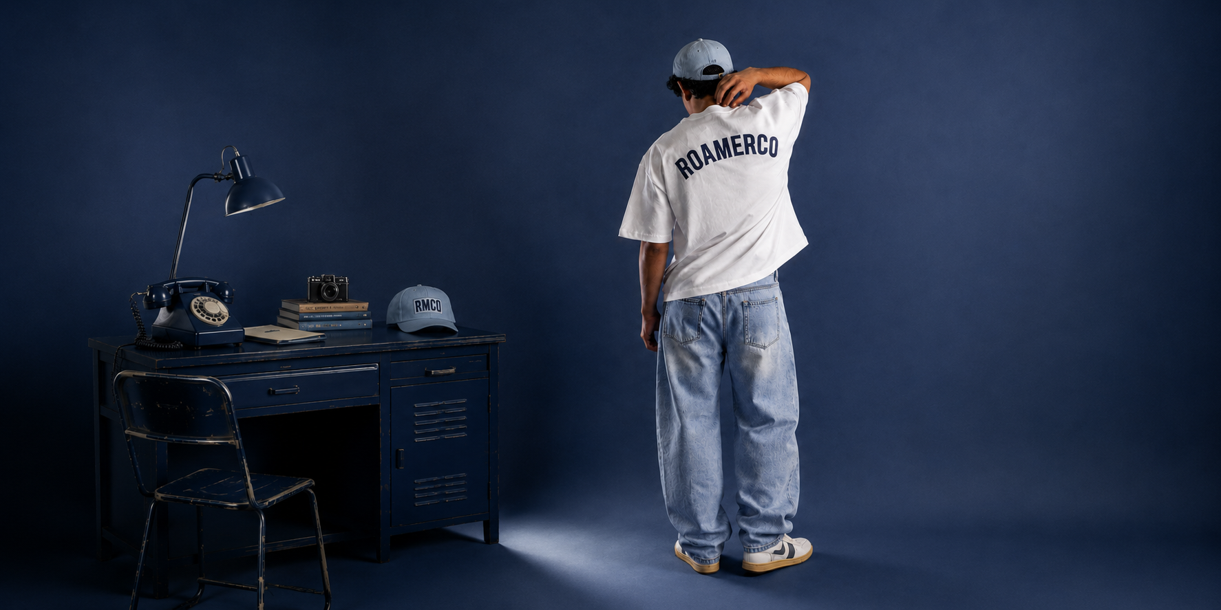 ROAMERCO modern local routewear — navy studio editorial